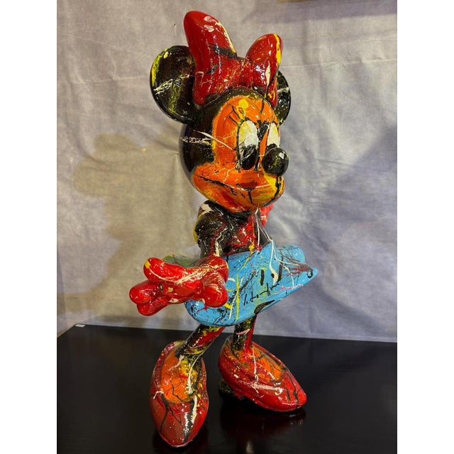 Resin sculpture by Italian artist Silvio Formichetti. The work depicts the iconic Minnie Mouse, reinterpreted with...