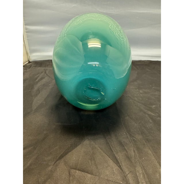 This vintage Mid Century Style Art Glass vase features a beautiful emerald seafoam ombre color with etched swirls, adding...