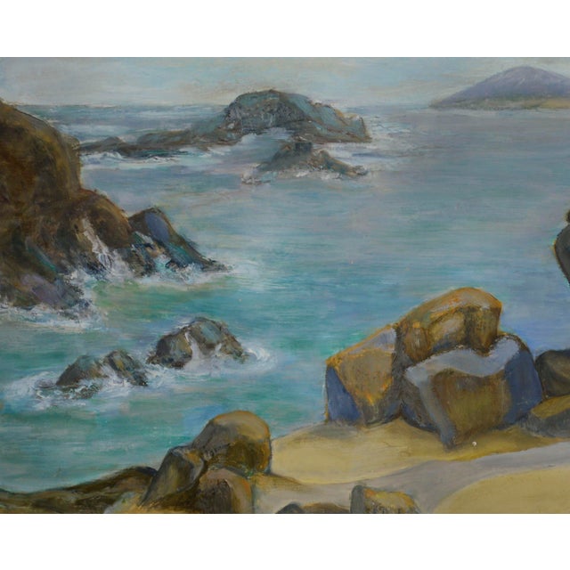 Gorgeous seascape oil painting of rocks along the seashore by California artist Genevieve Rogers (American, 20th Century)....