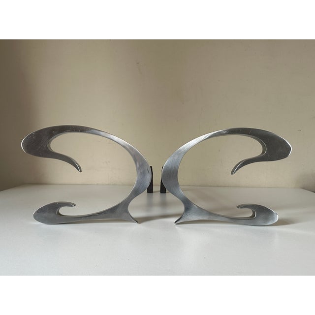 A beautiful pair of 1970s fireplace inserts by Jean Paul, crafted from metal with nickel-plated metal faces. Highly...