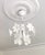 Beautiful 1980s vintage Murano glass chandelier featuring white floral design with white metal frame. This rare Italian...