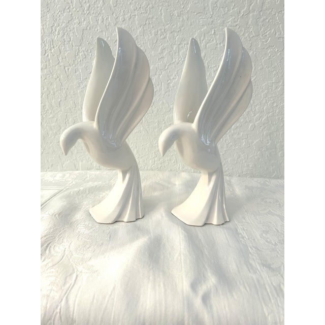 Gorgeous pair of vintage Fitz and Floyd fine porcelain white taper candleholders in an Art Deco design. Each holds one...