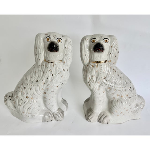 Extremely large pair of iconic English Staffordshire dogs made between the 1840s and 1900 by potteries in the...