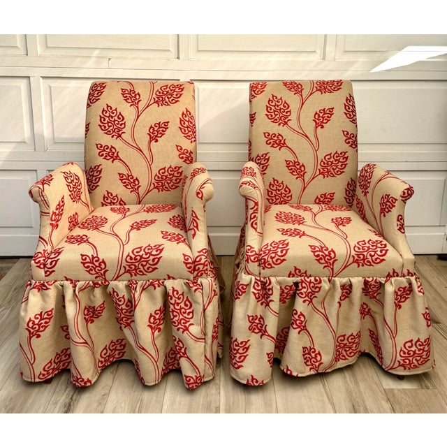Here is a wonderful pair of vintage armchairs with beautifully curved silhouettes and distinctive swan arms. The...