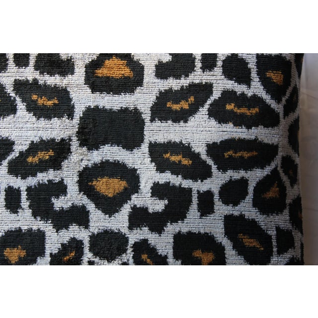 This stylish handmade velvet Ikat pillow cover can accent your sofa, chair, or bedding in a wide variety of interior...