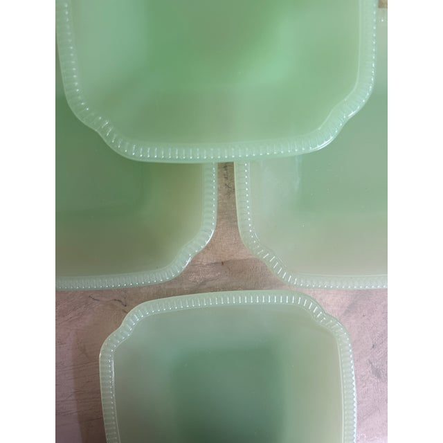 A beautiful set of six vintage jadeite plates attributed to Anchor Hocking, produced as part of their well-known Fire-King...