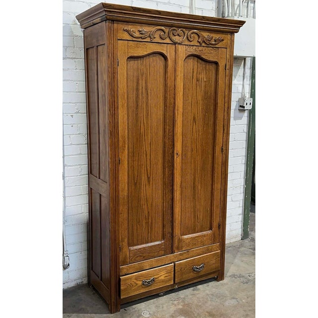 Antique Oak Wardrobe Armoire 2 Doors and 2 Drawers Crown Molding, Ornate Brass Hardware, Raised Panel Sides...