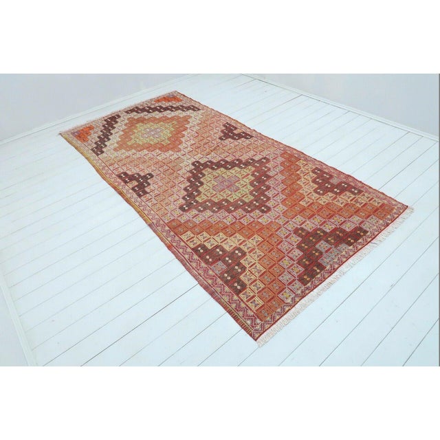 This beautiful, vintage, handwoven Kilim is approximately 60 years old. It is handmade, of very fine quality hand spun...