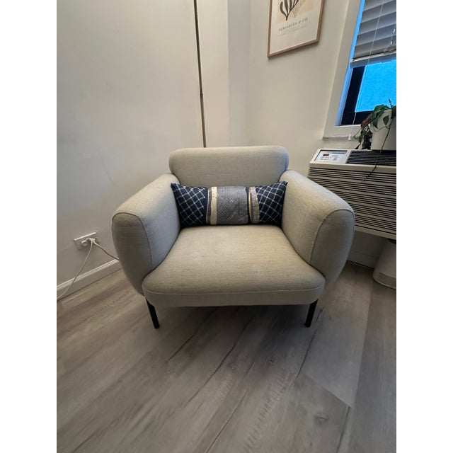 Deep-set comfy yet sturdy lounge chair that brings modernity and comfort into every home! Solid hardwood and plywood frame...