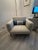 Deep-set comfy yet sturdy lounge chair that brings modernity and comfort into every home! Solid hardwood and plywood frame...