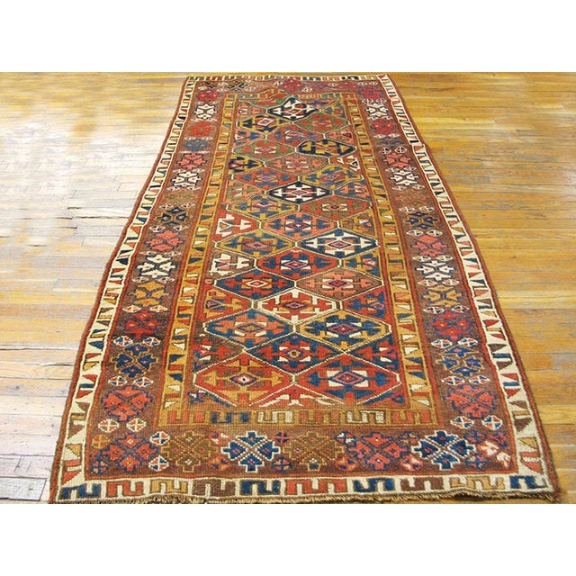 Handmade antique NW Persian carpet. Woven circa 1900. Rug size: 4'0" x 8'0". A Antique N.W. Persian Kurdish 1900's Rug,...