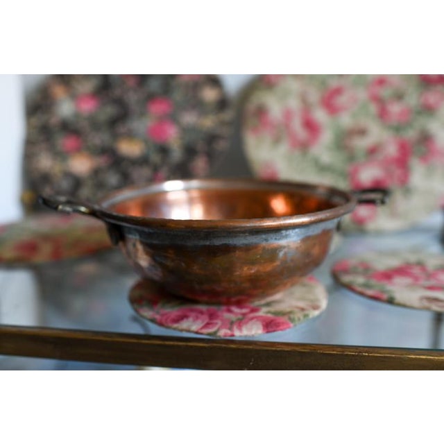 Lovely handmade brass and copper handled rustic primitive bowl. With handles measures 10" across, at widest measures 8"...
