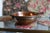 Lovely handmade brass and copper handled rustic primitive bowl. With handles measures 10" across, at widest measures 8"...