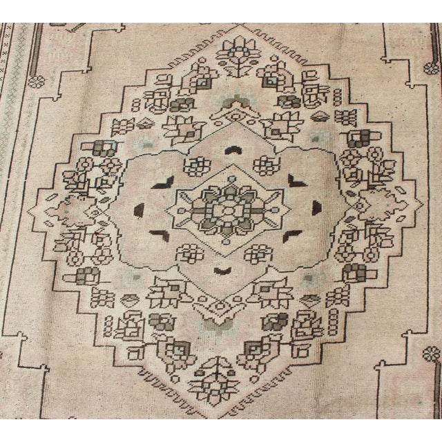 Textile Vintage Turkish Oushak Rug With Center Medallion Design in Earthy Colors For Sale - Image 7 of 10