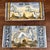 Hand Painted Signed Italian Neoclassical Wall Tiles- A Pair hand-painted ceramic tiles inspired by the historic 17th-...