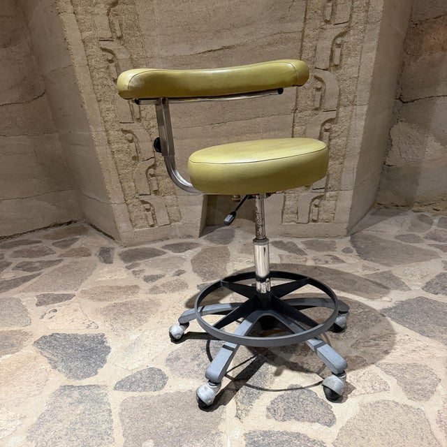 For your consideration, a vintage dental assistant's stool (often called an ergonomic operator or nurse stool) featuring a...