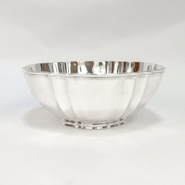 A fine signed vintage silver fruit bowl. By Tiffany & Co. In sterling silver. With a shaped rim and lobed walls. Fully...