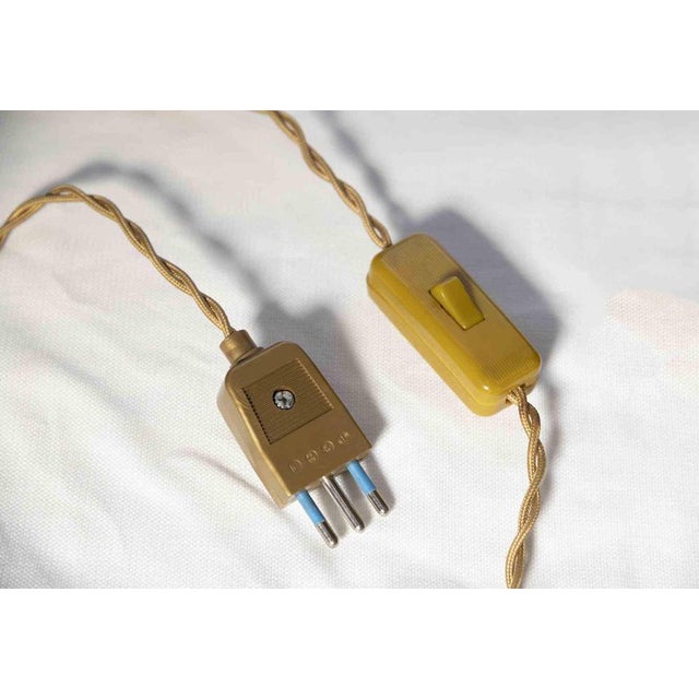 Camel table lamp is an original design lamp realized in orientalist style the early/mid 20th century. Table lamp in gilded...