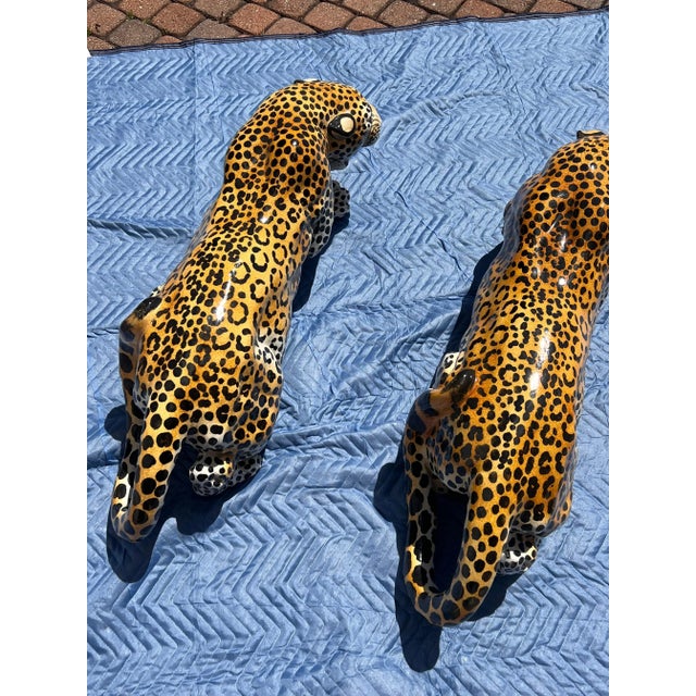 A striking pair of vintage Italian glazed ceramic leopards, mid 20th century - probably late 1960s or early 1970s. These...