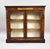 A fine and substantial mid-Victorian mahogany two-door pier cabinet, dating to approximately circa 1860. The cabinet is...