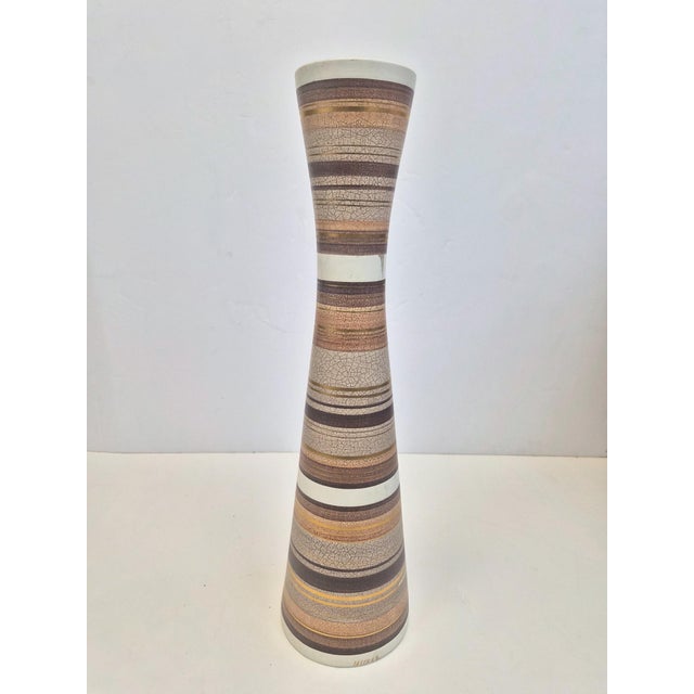 A slender hourglass Mid Century Modern Vase. This vase is made by the Sascha Brastoff company (1917-1993), California, and...
