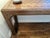 Solid wood, mid century style herringbone top console table, perfect for foyer or behind couch.