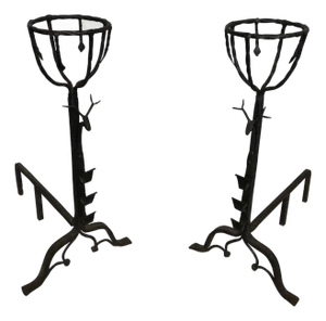 Important pair of wrought iron border andirons with deer heads