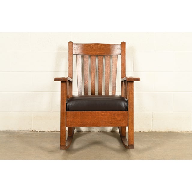 A gorgeous antique Mission or Arts & Crafts period rocking chair In the manner of Stickley Brothers USA, Circa 1910...