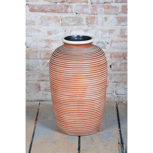 This unique ceramic vase, created in Czechoslovakia during the 1940s, carries the unmistakable signature of the...