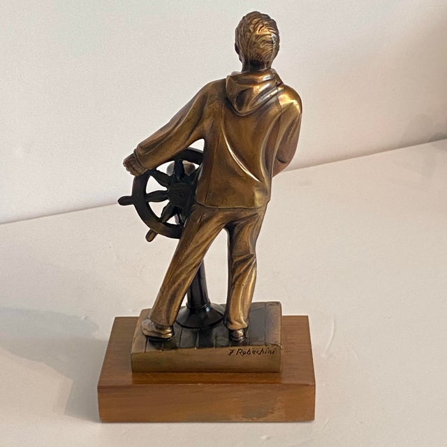 This statue was sculpted by Ferdinand G. Rebechini, a mid-century artist known for creating specialized, highly detailed...