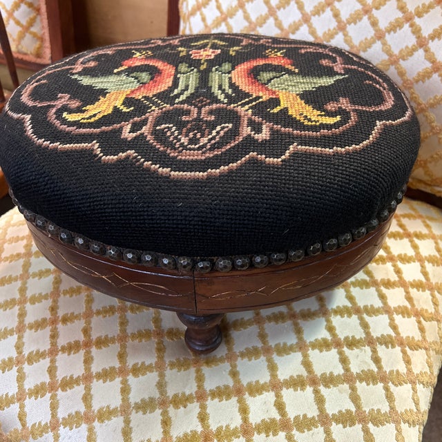 Gorgeous Petite 19th century French Needlepoint footstool with rare Bird Motif. This remains in original very good...