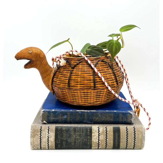 Delightful turtle cachepot made by Shanghai Handicrafts in the mid-late 20th century. This whimsical piece was skillfully...