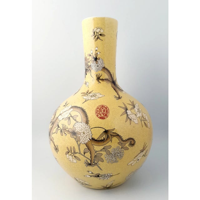 Chinese porcelain Da Ya Zhai tianqiuping, a globe shape vase with a white glazed lip, an imperial yellow glazed exterior...