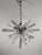 Italian Starburst Sputnik Chandelier in Chrome & Murano Glass, 1960s, in Very Good conditions. Designed 1960 to 1969 Up to...