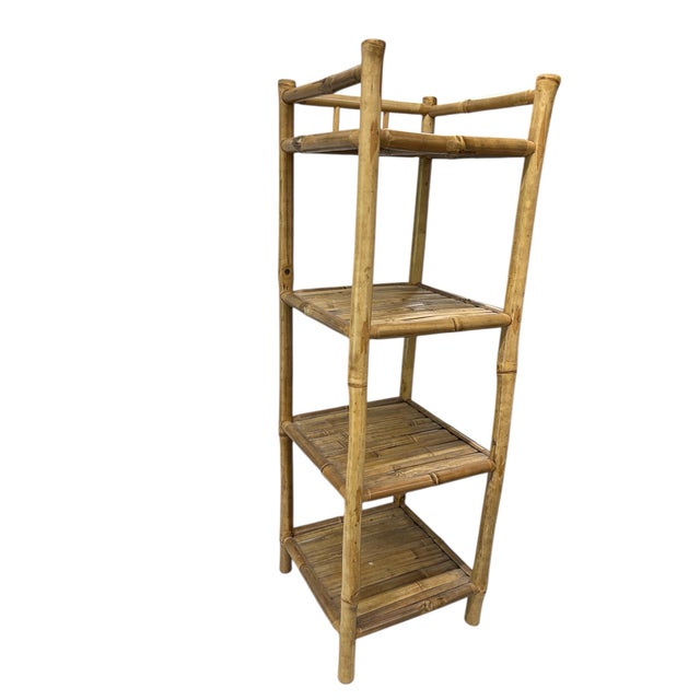 Coastal Bamboo four tier free standing shelves in natural finish. Measures 12.” square x 36” h. Goes with most decor styles.