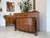 Restored Empire-style columned chest of drawers, circa 1820 – with full columns and exquisite walnut veneer. Dimensions:...
