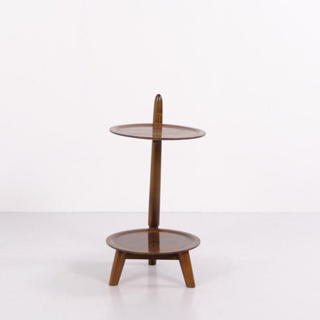 Pair of plant stands or side tables designed by Edmund Jørgensen and crafted from walnut in the 1950s. The tables feature...