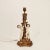 Table lamp or baroque -style desktop of the 50s. Body and polychrome plaster base and finished in gold bread, representing...