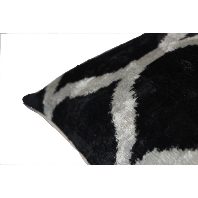 Bohemian silk ikat pillow with vibrant colors of red, beige and blue. Super hand soft. Pillow has a zipper for closure....