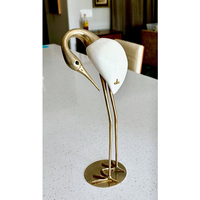Italian Mid century Crain bird sculpture produced by De Stijl Firenze, 1960s, composed of brass, white lacquered wood and...