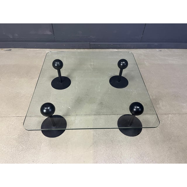 Rare coffee table model 'Pepper Young' designed by Philippe Starck and produced by Disform. The feet are metal with a...