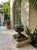 Vintage Weathered Cast Stone Garden Urn Planter on Stepped Square Pedestal Base For Sale - Image 9 of 12