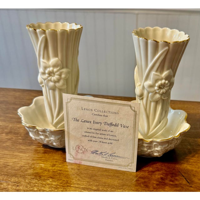This set features two elegant Lenox porcelain Bud vases and two elegant Lenox porcelain Bud vases and two matching...