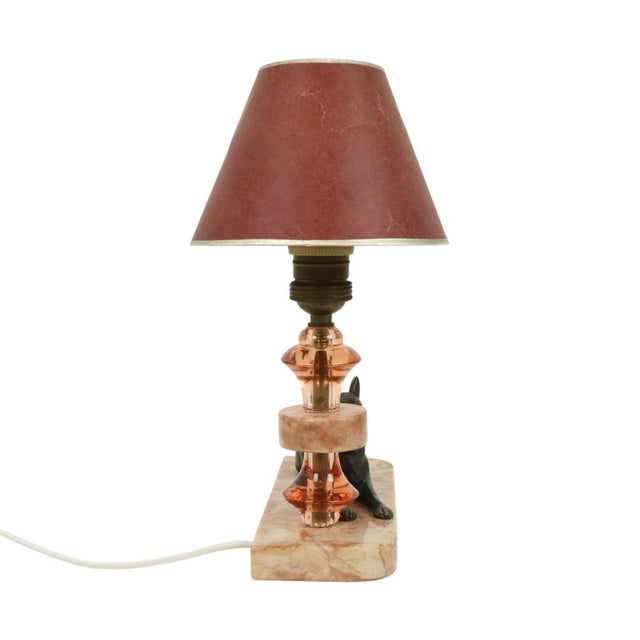 Nice Art Deco table lamp made of pink marble and colored glass, a figurine of a shepherd dog made of a zinc alloy and the...
