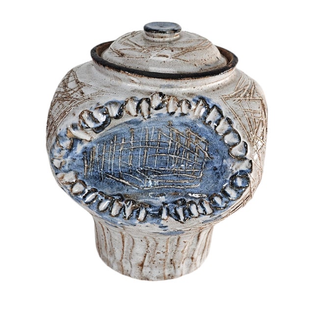This vintage signed studio art pottery lidded jar captures the essence of artistic modernity. It features blue and gray...