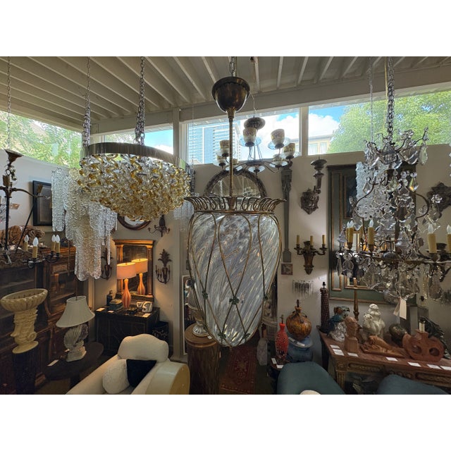 Italian Modern Bronze And Glass Lantern After Pietro Chiesa. Offered is a stunning Italian mid century lantern with bronze...