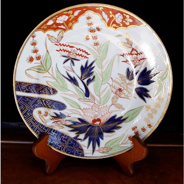 A fine example of the desirable and rare thumb and finger gilt Imari pattern with green foliate decoration and orange...