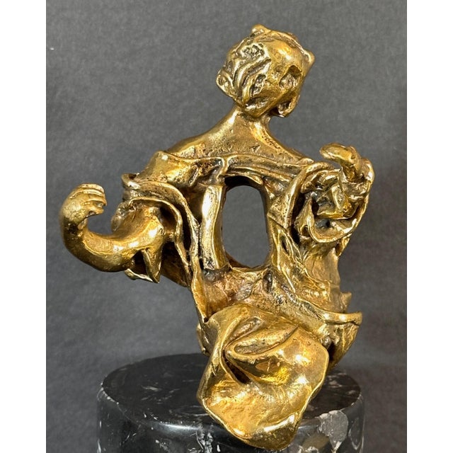 ARTIST: Salvador Dali TITLE: The Madonna of Port Lligat MEDIUM: Sculpture with Bronze Patina SIGNED: Engraved signature in...