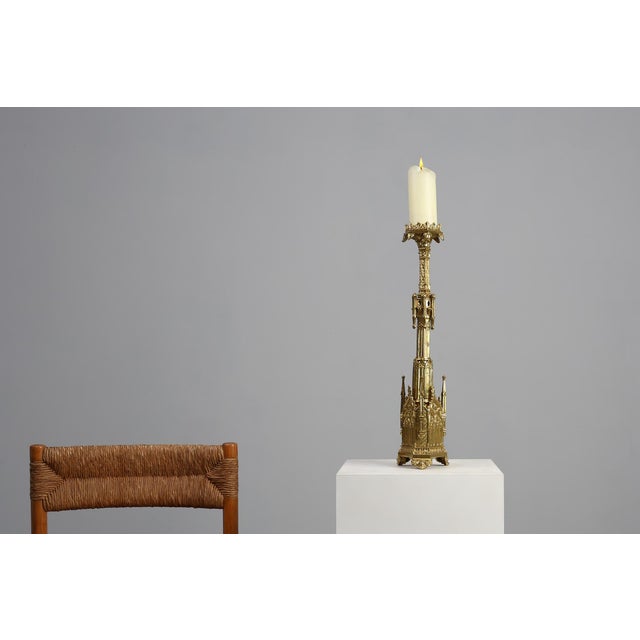 A striking example of late‑19th‑century french ecclesiastical metalwork, this neo‑gothic candleholder. It was crafted...