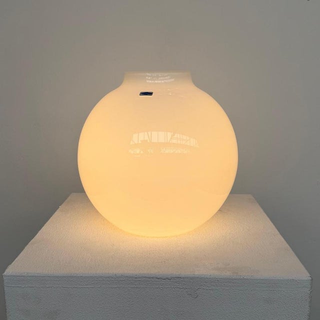 Scandinavian Modern Table Lamp in Opaline Glass Finland 1980s Mouth blown opaline glass in a near spherical form, finished...